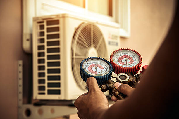 Professional Air Conditioning Service technician working in Orange Lake, FL